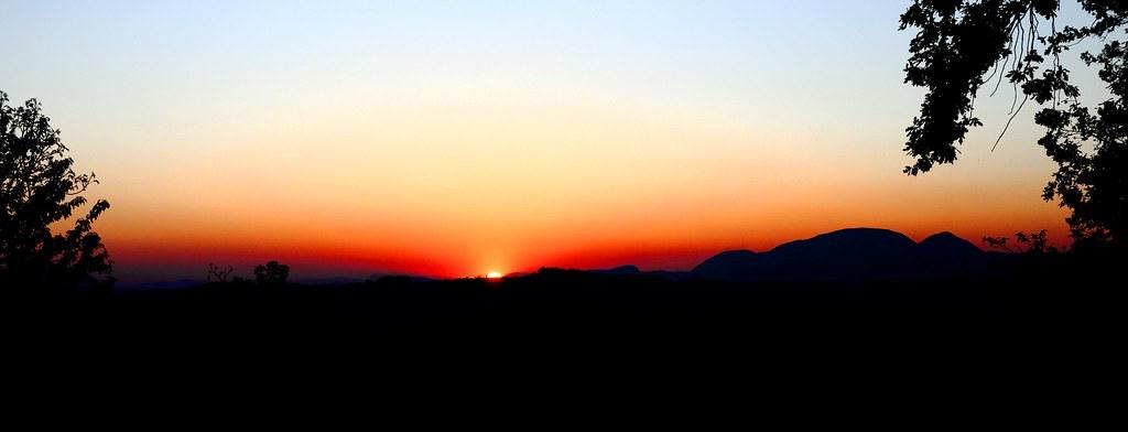 Sunset over layered hills in Central Europe